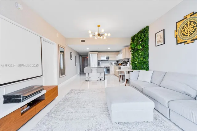 a living room with furniture and a table