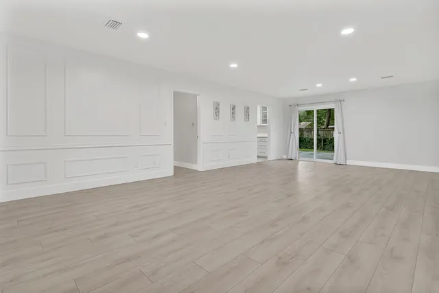 a stove top oven sitting inside of a kitchen