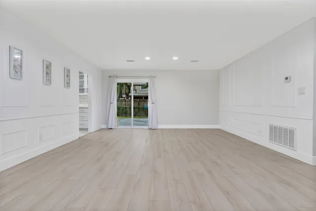 a bathroom with a sink and a window