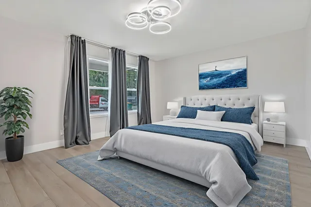 a bathroom with double vanity sink and a mirror