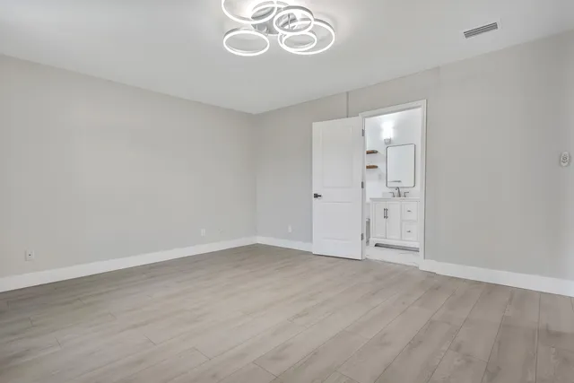 a bathroom with a shower and a bath tub