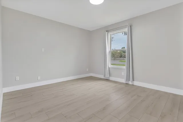 a view of a backyard with a garden