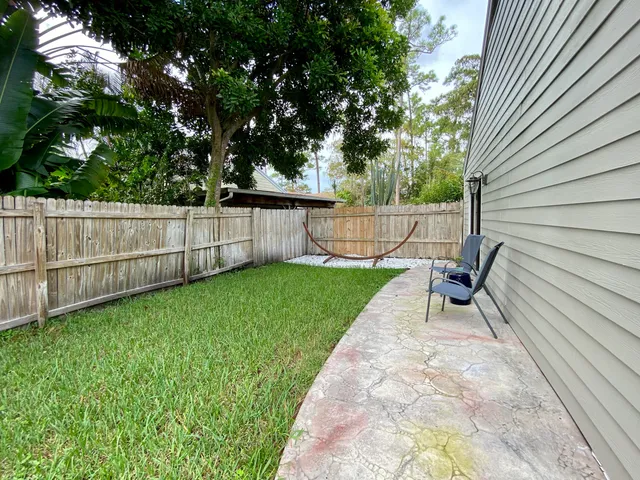 a view of backyard with green space