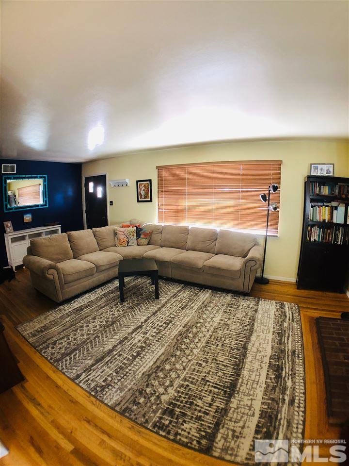 765 Mcdonald Reno, NV 89503 - Photo 3 of 15 a living room with furniture and a rug