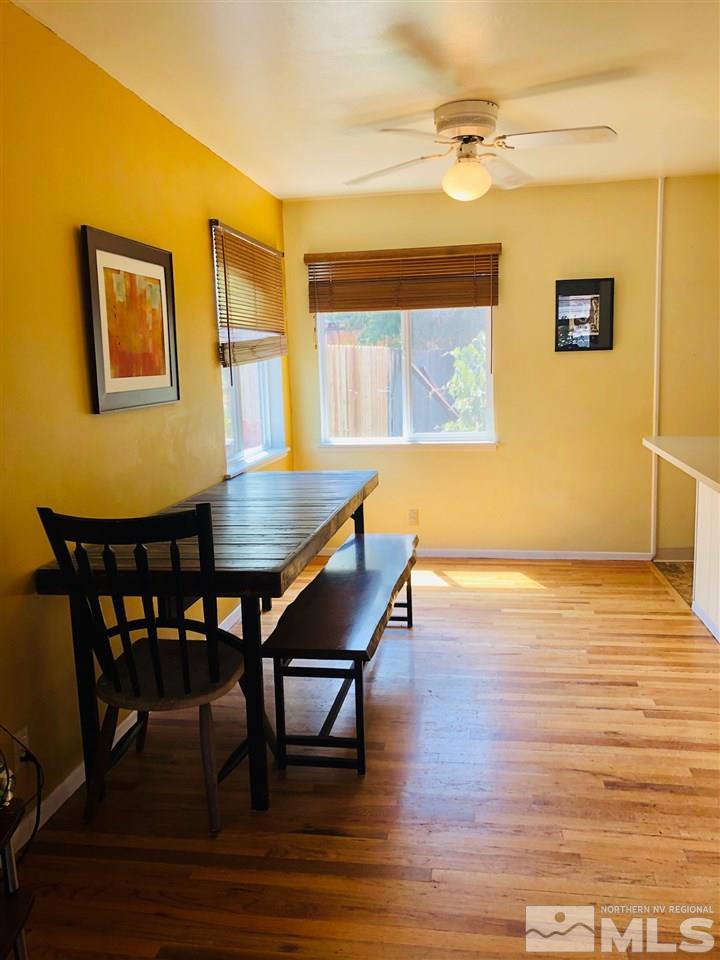 765 Mcdonald Reno, NV 89503 - Photo 7 of 15 a view of a dining room with furniture and wooden floor