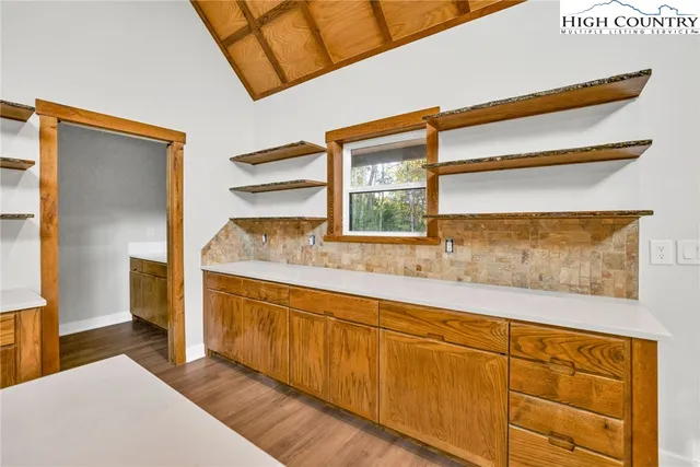 a bathroom with a sink and a window
