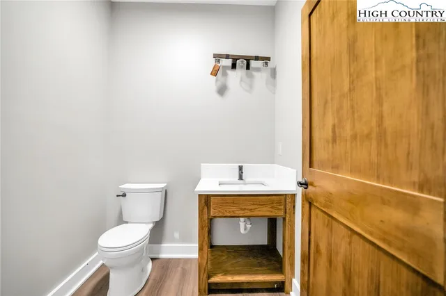 a bathroom with a toilet and a sink