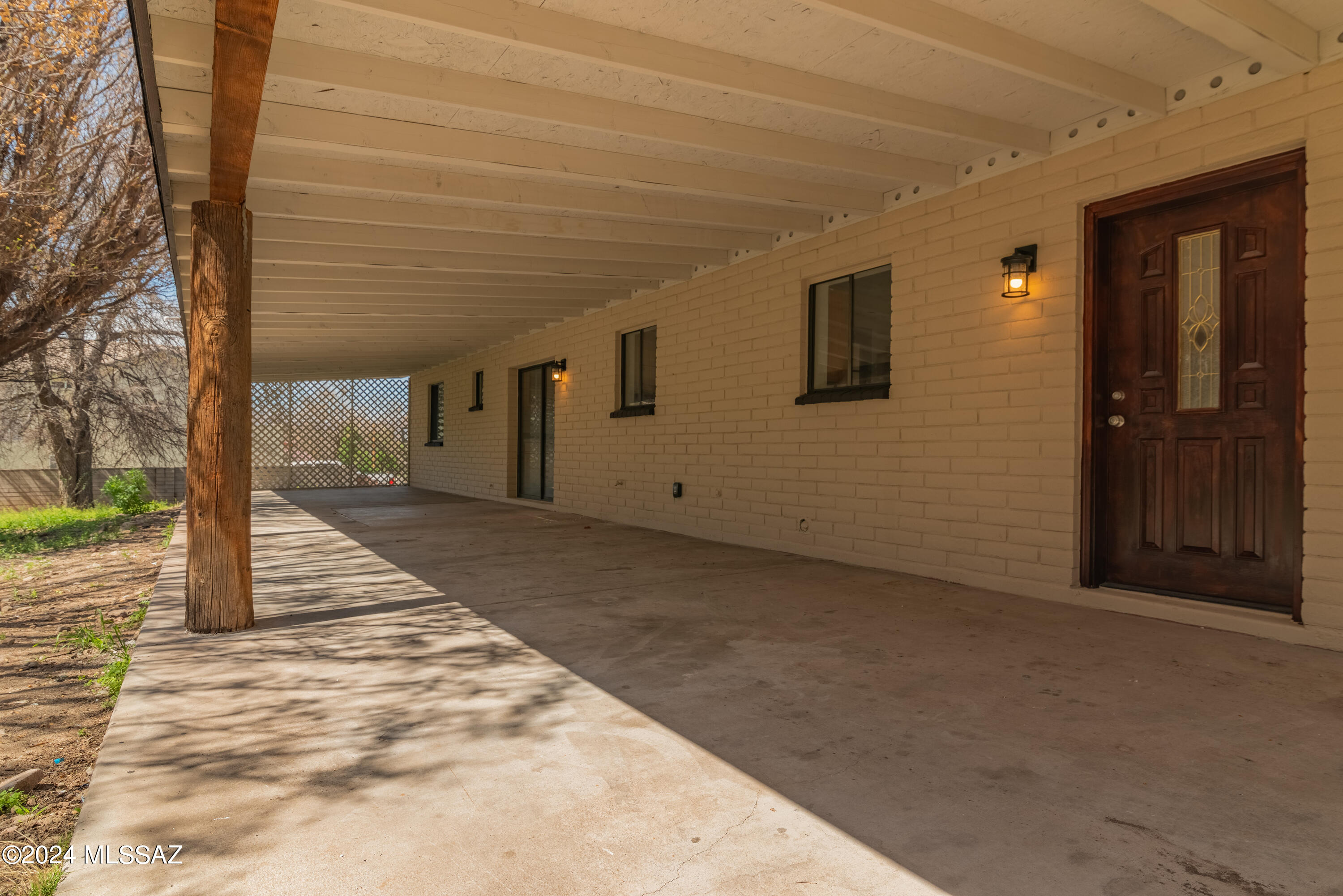 273 Harpo Court Rio Rico, AZ 85648 - Photo 30 of 34 a view of a house with backyard and trees