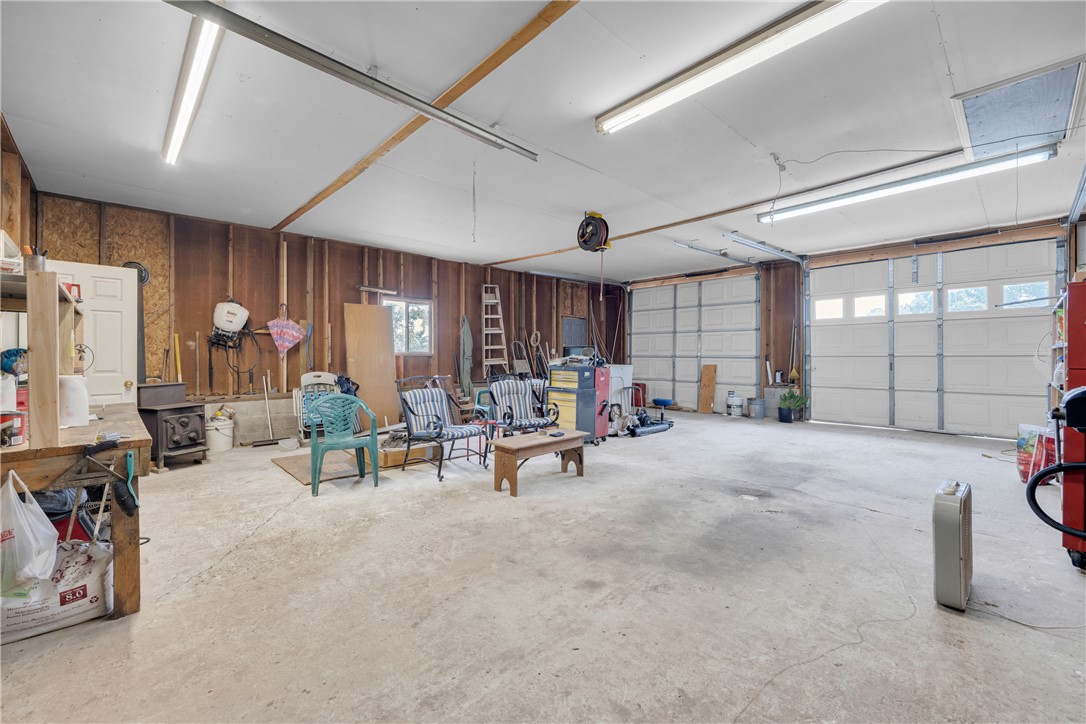 721 Cedar Crest Trail Walhalla, SC 29691 - Photo 35 of 47 A spacious and well-lit garage offers ample room for vehicles and projects.