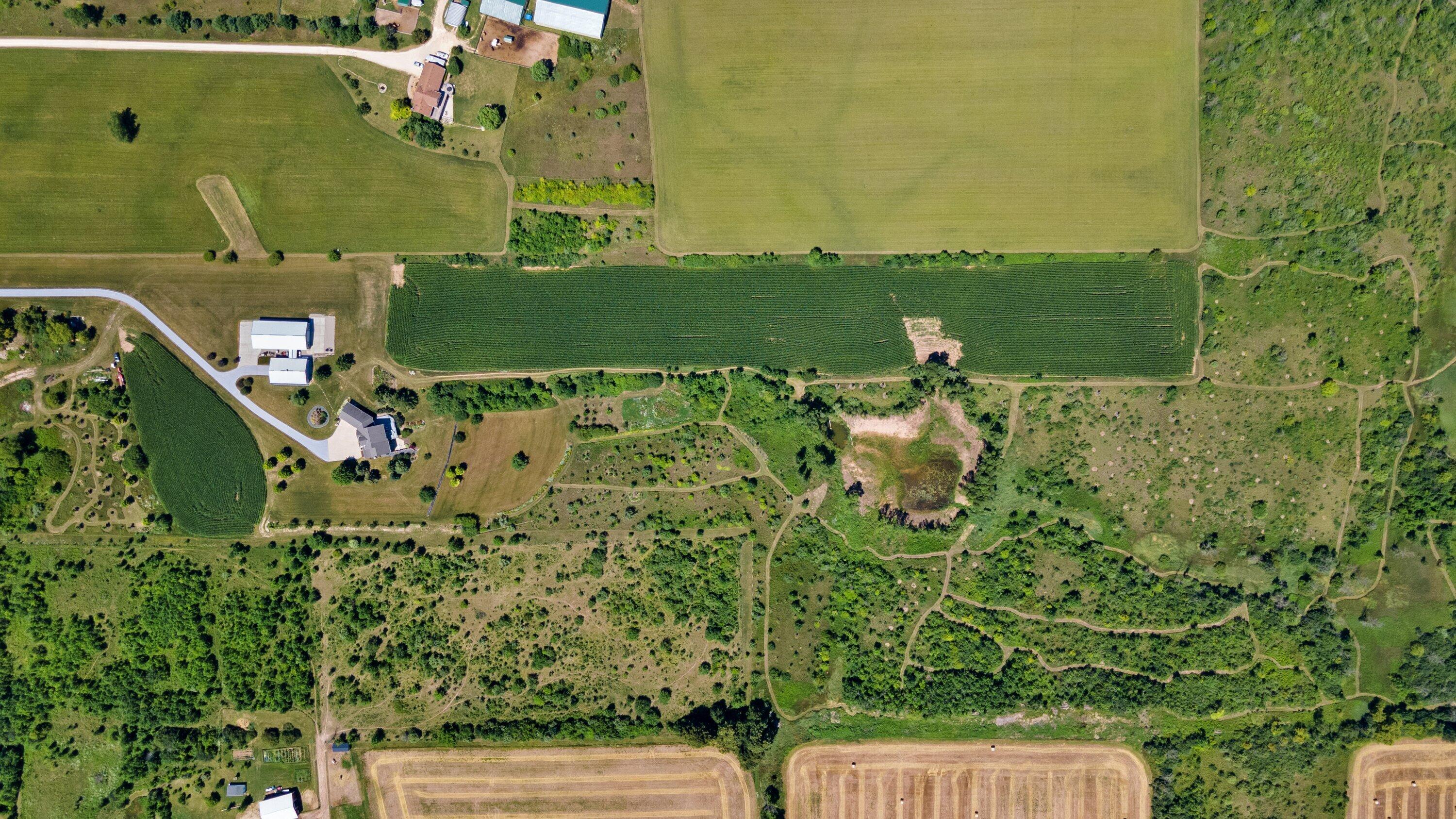 5102 6 Mile Road Belgium, WI 53004 - Photo 15 of 74 Aerial view- pond w/ clay bottom