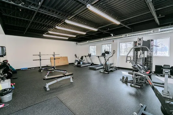 a view of a room with gym equipment