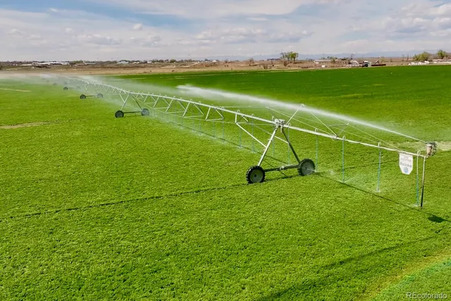 a view of a lake with a big yard