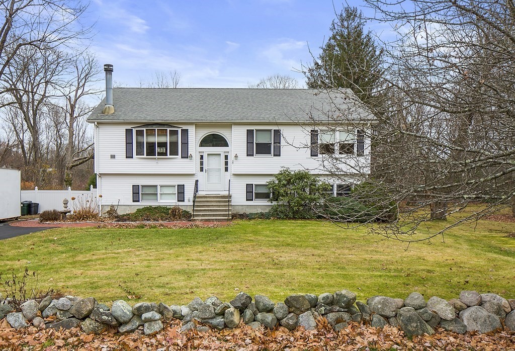 39 Shufelt Road Walpole, MA 02071 - Photo 1 of 33 a view of a house with a swimming pool