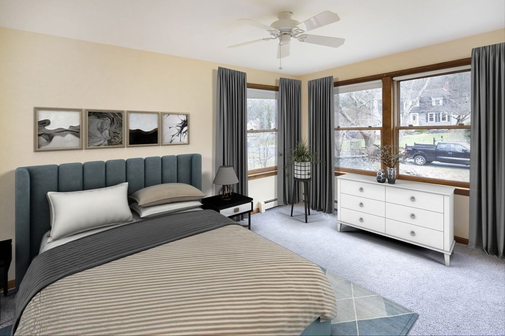 39 Shufelt Road Walpole, MA 02071 - Photo 11 of 33 a bedroom with a bed and large window