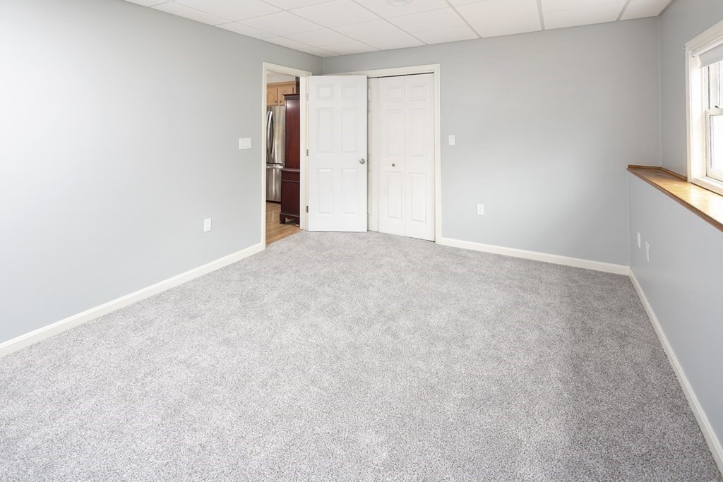 39 Shufelt Road Walpole, MA 02071 - Photo 15 of 33 a view of an empty room and a window