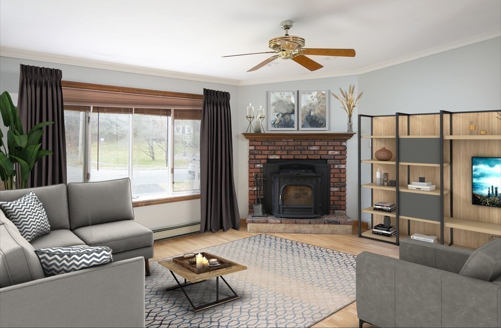 39 Shufelt Road Walpole, MA 02071 - Photo 2 of 33 a living room with furniture and a fireplace