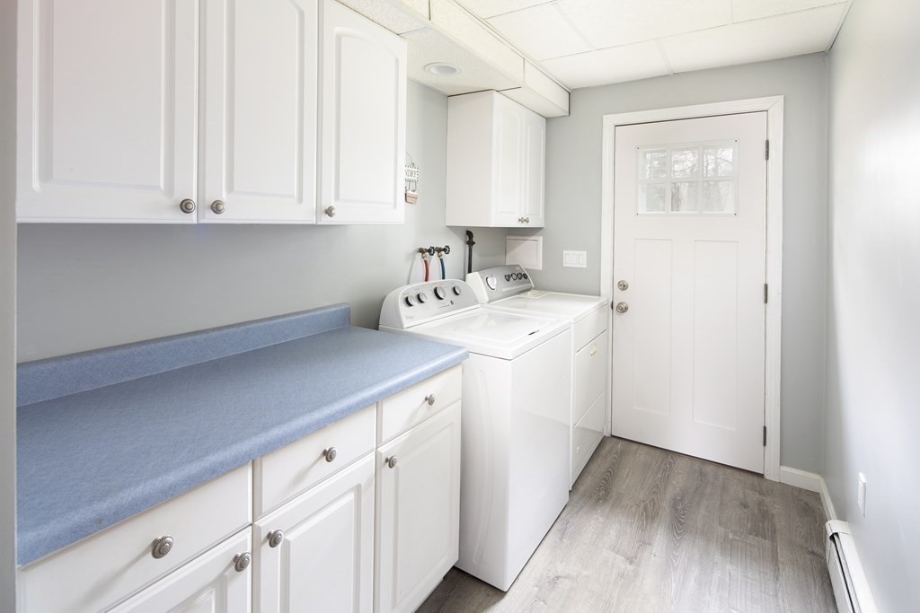 39 Shufelt Road Walpole, MA 02071 - Photo 21 of 33 a utility room with sink dryer and washer
