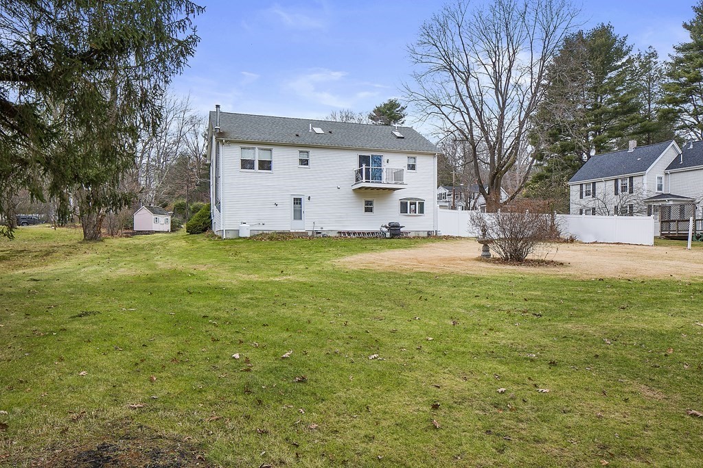 39 Shufelt Road Walpole, MA 02071 - Photo 31 of 33 a view of a house with a yard