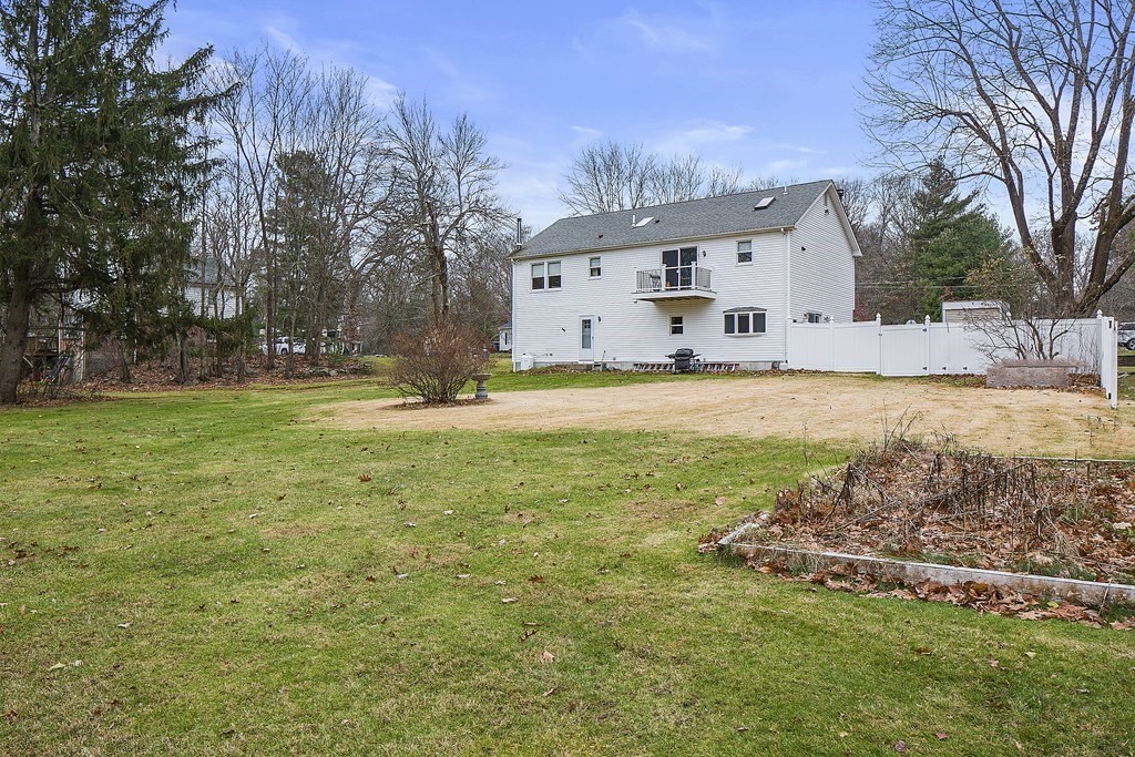 39 Shufelt Road Walpole, MA 02071 - Photo 32 of 33 a view of a house with backyard and trees