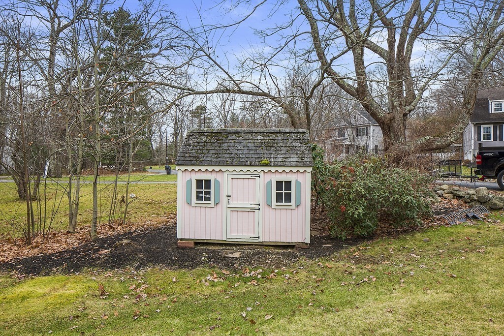 39 Shufelt Road Walpole, MA 02071 - Photo 33 of 33 a view of a house with backyard and tree