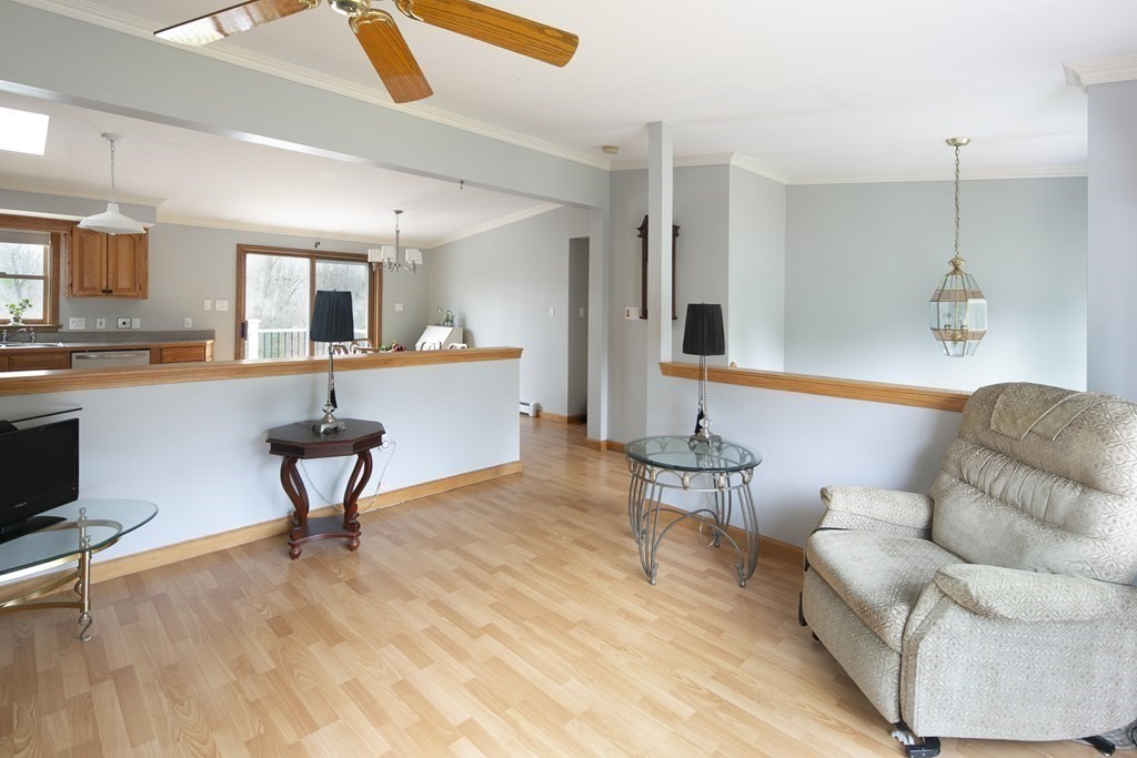 39 Shufelt Road Walpole, MA 02071 - Photo 6 of 33 a living room with furniture and a wooden floor