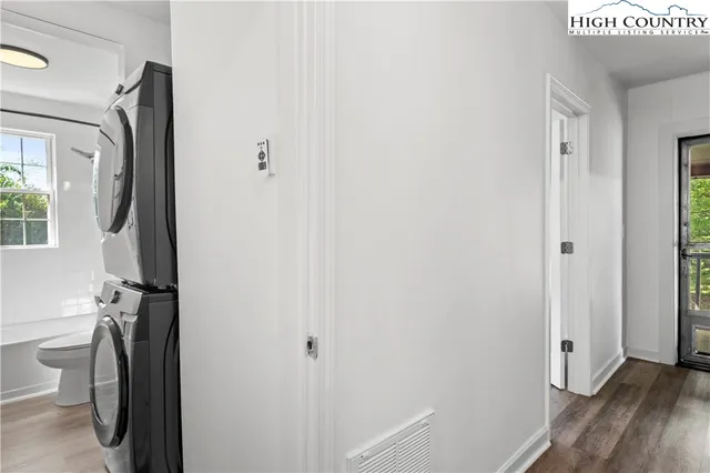 a view of a bathroom from a hallway