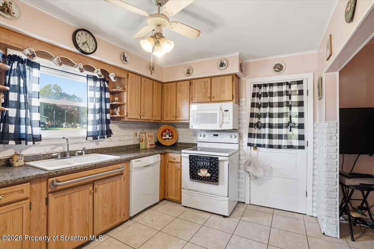 101 Stone Street Moosic, PA 18507 - Photo 7 of 53 a kitchen with a stove cabinets and window