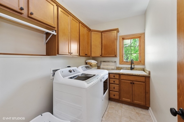 7313 Lone Oak Road Spring Grove, IL 60081 - Photo 19 of 29 a utility room with sink dryer and washer