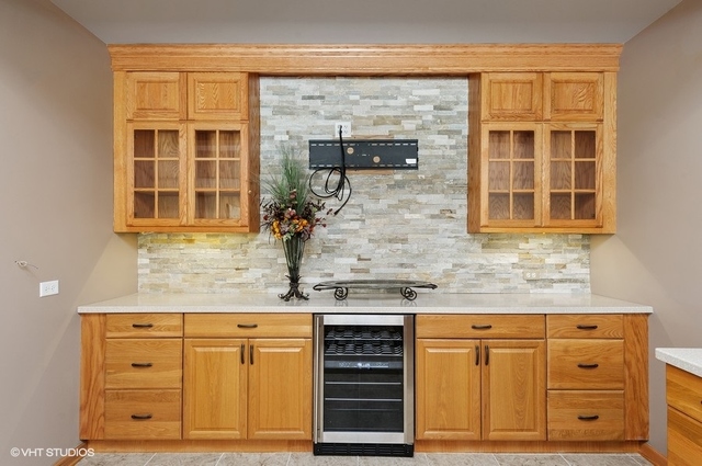 7313 Lone Oak Road Spring Grove, IL 60081 - Photo 21 of 29 a kitchen with granite countertop cabinets and window