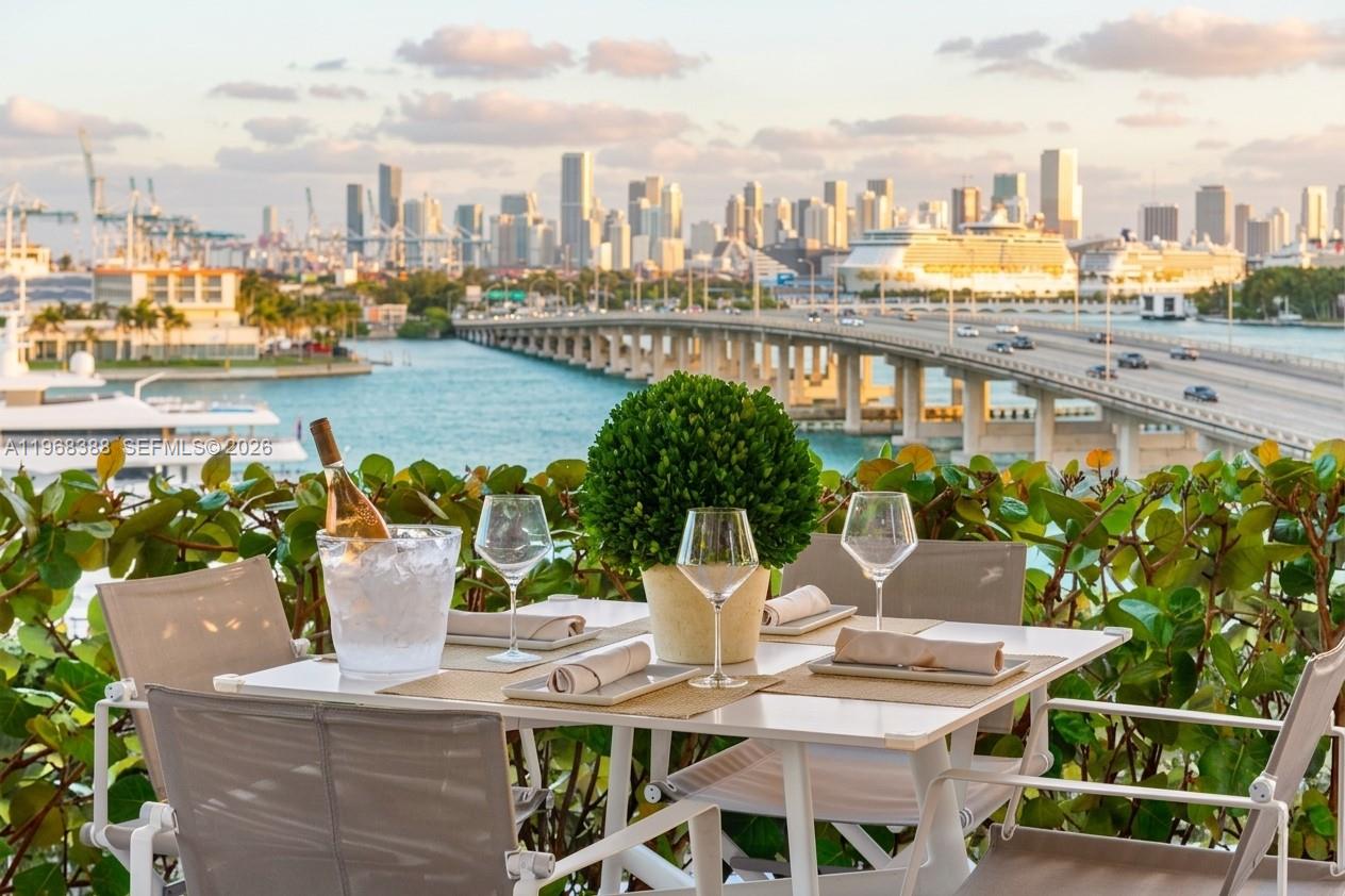 450 Alton Road, Unit 1202 Miami Beach, FL 33139 - Photo 39 of 68 a view of a terrace with sitting area