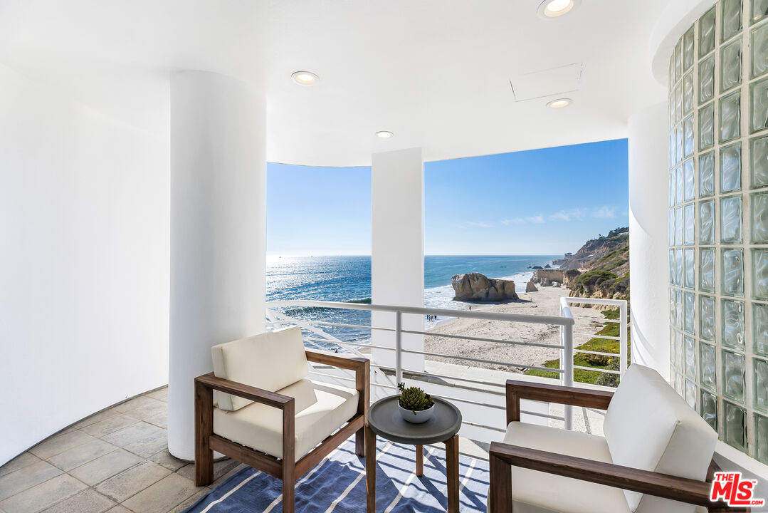 32062 Pacific Coast Highway Malibu, CA 90265 - Photo 13 of 31 a living room with furniture and a flat screen tv