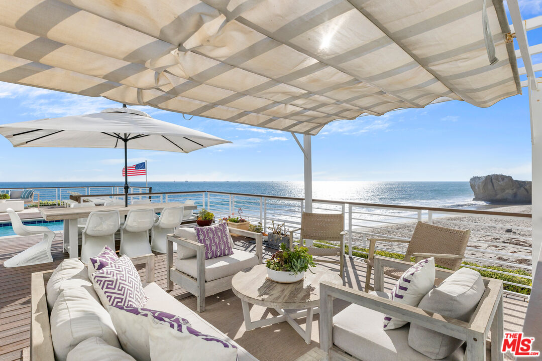 32062 Pacific Coast Highway Malibu, CA 90265 - Photo 23 of 31 a roof deck with patio and furniture