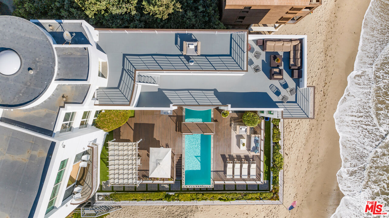 32062 Pacific Coast Highway Malibu, CA 90265 - Photo 24 of 31 an aerial view of a house with a yard