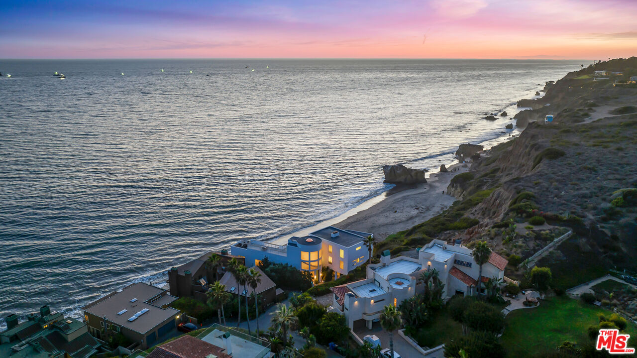 32062 Pacific Coast Highway Malibu, CA 90265 - Photo 29 of 31 a view of an ocean beach and mountain