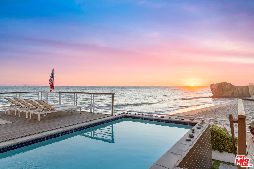 32062 Pacific Coast Highway Malibu, CA 90265 - Photo 3 of 31 a view of a balcony with an ocean view