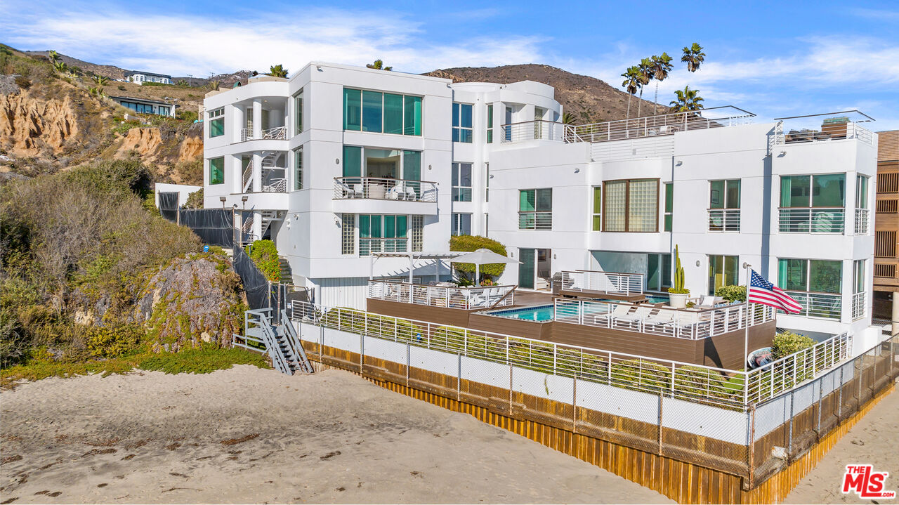32062 Pacific Coast Highway Malibu, CA 90265 - Photo 6 of 31 a view of a building with a patio