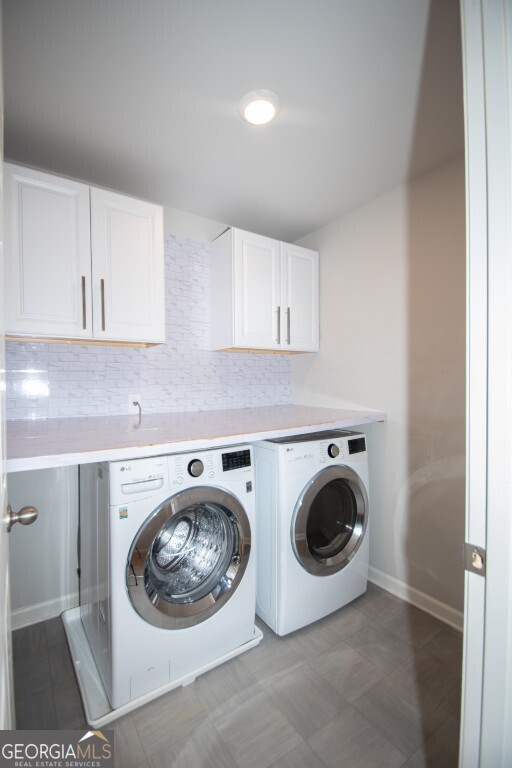 8084 Louis Drive Locust Grove, GA 30248 - Photo 22 of 33 a utility room with dryer and washer