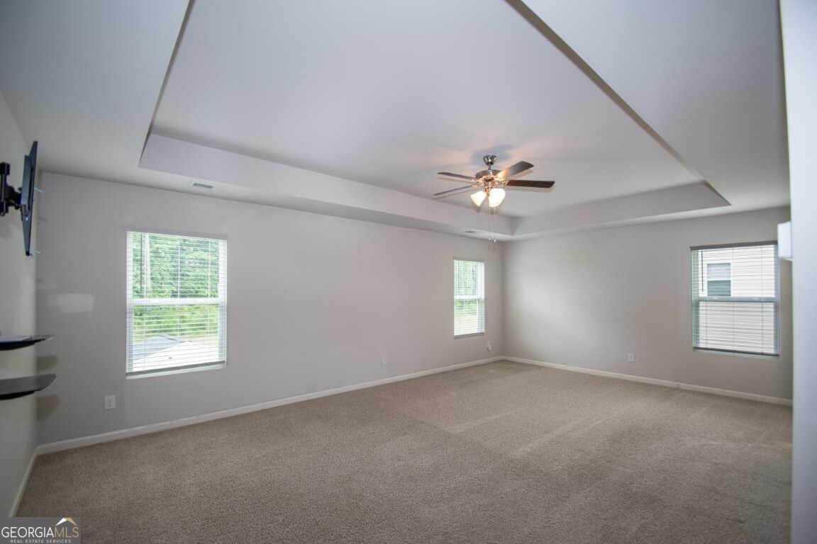 8084 Louis Drive Locust Grove, GA 30248 - Photo 23 of 33 a view of an empty room with a window