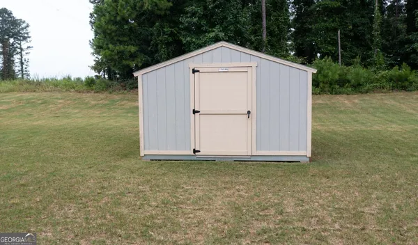 a view of backyard of house