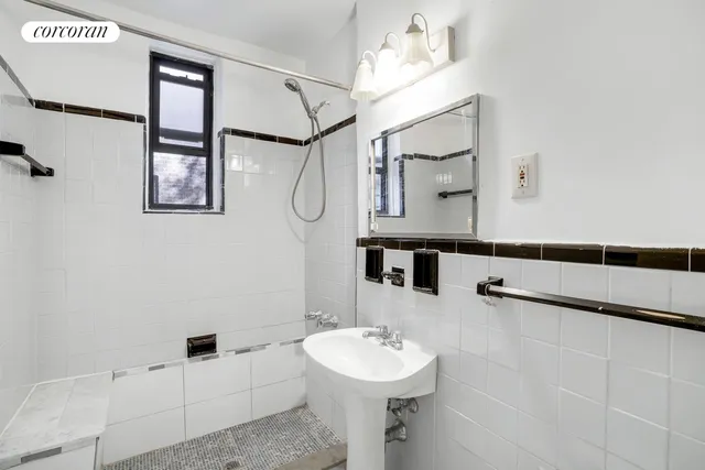 a bathroom with a sink and mirror