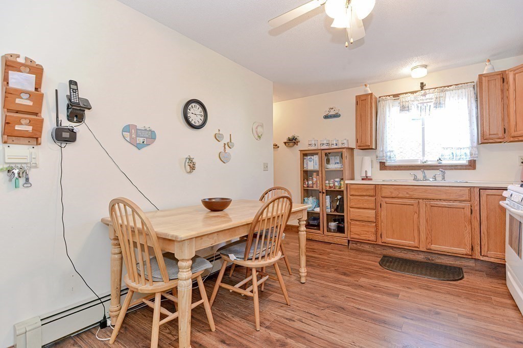 29 Winter Street Fall River, MA 02720 - Photo 13 of 34 a view of a dining room with furniture and wooden floor