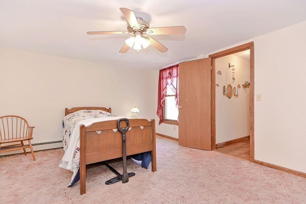 29 Winter Street Fall River, MA 02720 - Photo 23 of 34 a view of a livingroom with furniture and a ceiling fan