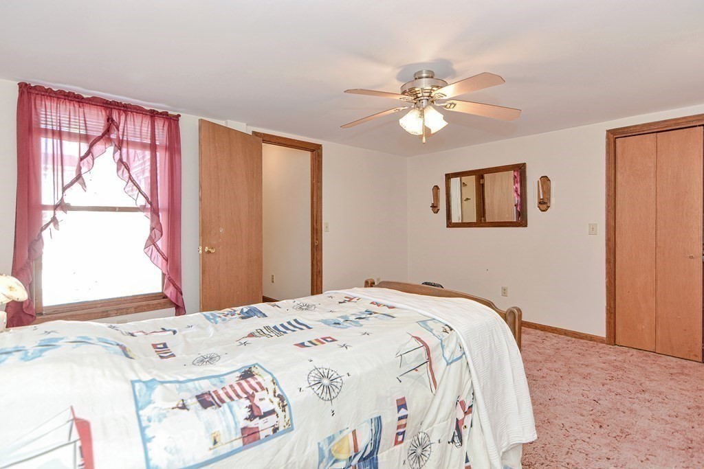 29 Winter Street Fall River, MA 02720 - Photo 24 of 34 a bedroom with a bed and a window