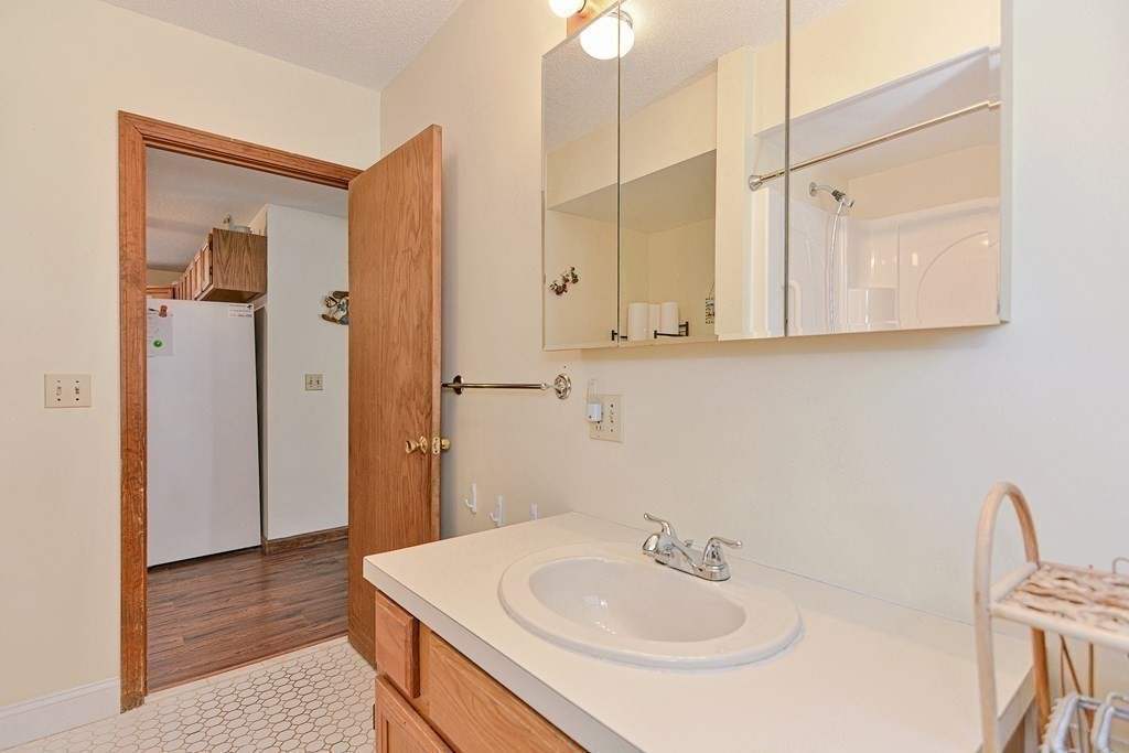 29 Winter Street Fall River, MA 02720 - Photo 28 of 34 a bathroom with a sink a toilet and shower