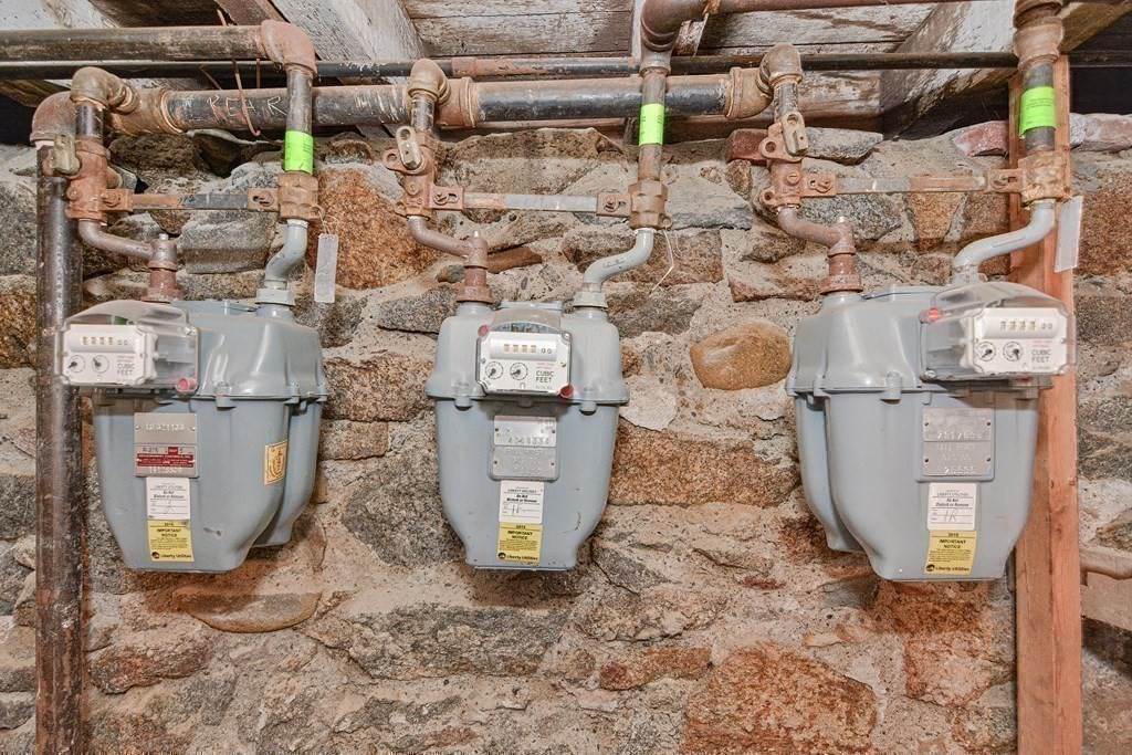 29 Winter Street Fall River, MA 02720 - Photo 32 of 34 a view of water heater room