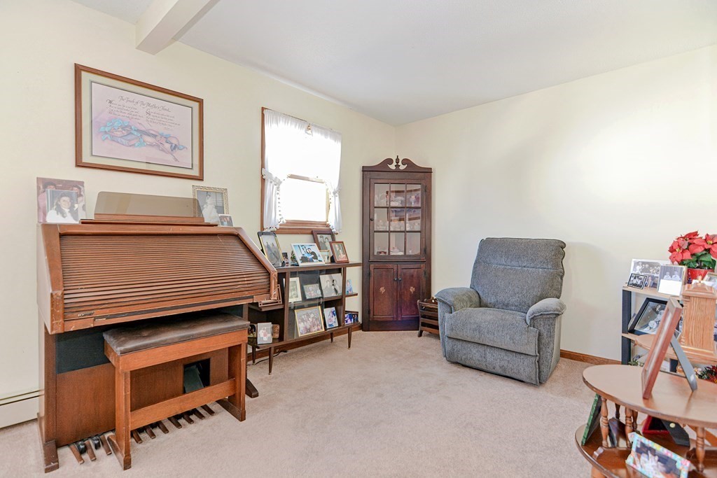 29 Winter Street Fall River, MA 02720 - Photo 8 of 34 a bedroom with furniture and a bed