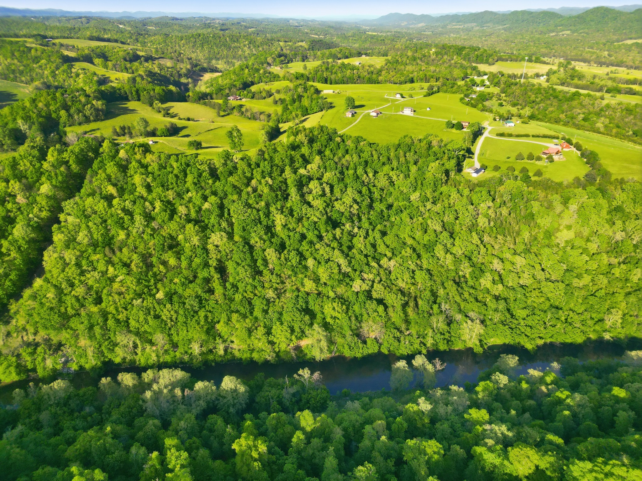 364 Lock Lane Tazewell, TN 37879 - Photo 7 of 15 a view of a city with lush green forest
