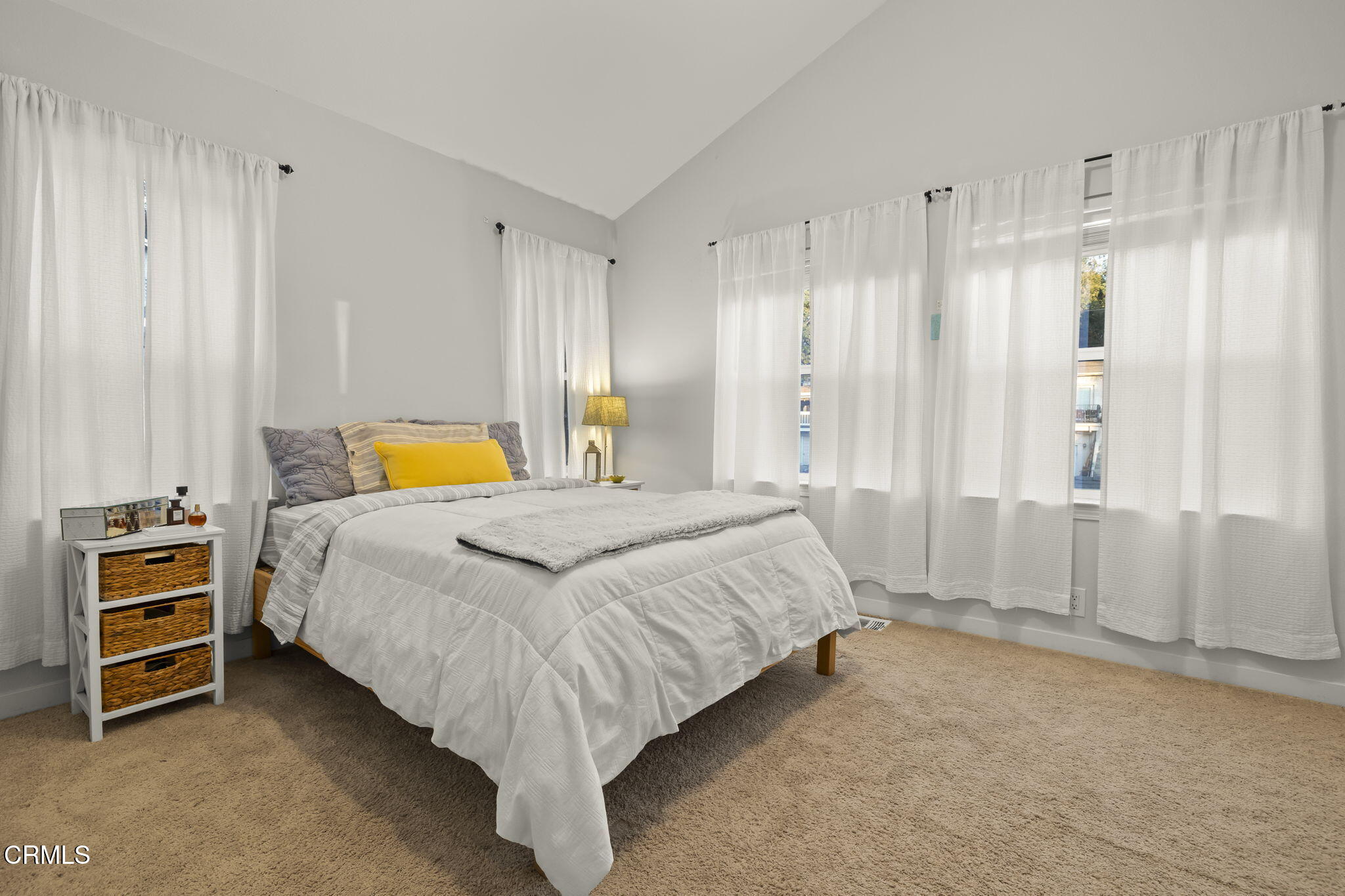 231 Valley Road Oak View, CA 93022 - Photo 23 of 46 a spacious bedroom with a bed and a cabinets