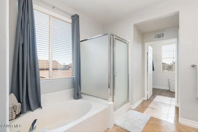 a view of a patio with a backyard