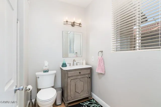 a view of a hallway with windows